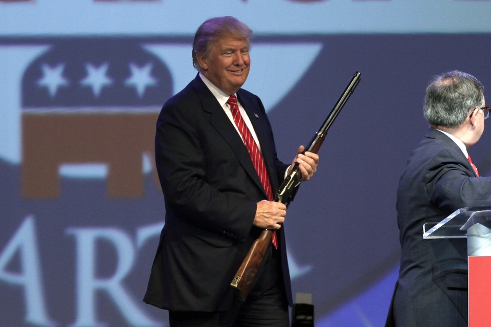 Trump holding Worcester rifle